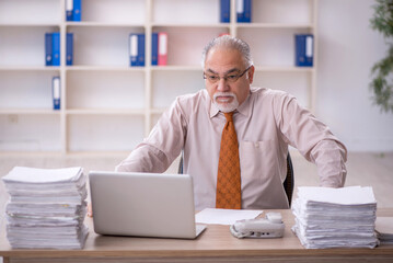 Old male employee and too much work in the office