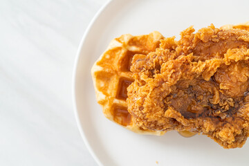 fried chicken waffle with honey or maple syrup