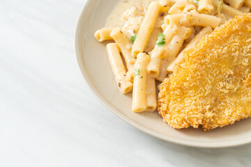 quadrotto penne pasta white cream sauce with fried fish