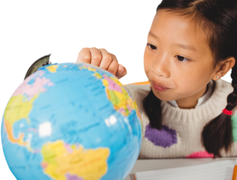 Student looking at globe
