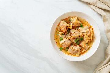 pork wonton soup or pork dumplings soup with roasted chili