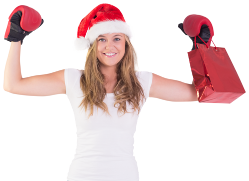 Festive blonde with boxing gloves and shopping bag