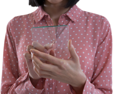 Mid section of female executive holding a glass smartphone