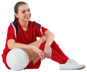 Cute football player sitting with ball