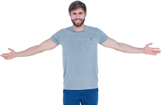 Portrait of smiling young man with arms outstretched 