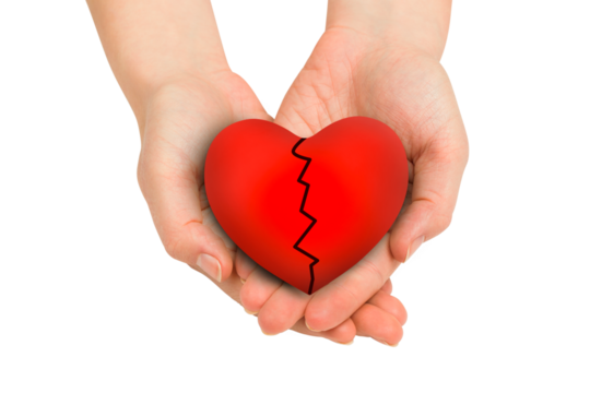 Couple holding broken heart in hands