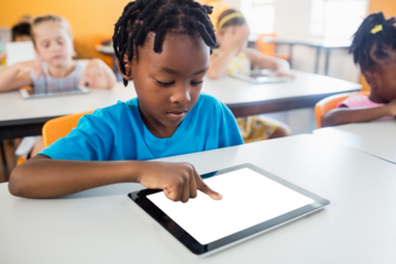 Boy using tablet computer