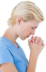 Pretty blond woman praying