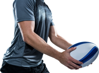 Midsection of rugby player in black jersey holding ball