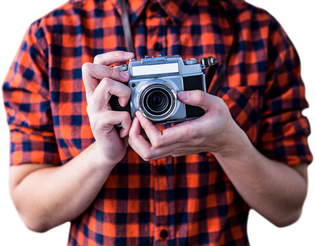 Hipster holding an old camera