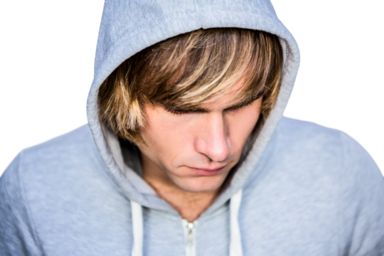  Man in hood jacket hacking a laptop