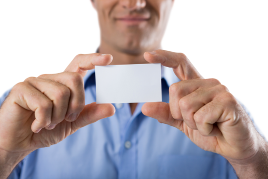 Male executive holding a blank business card
