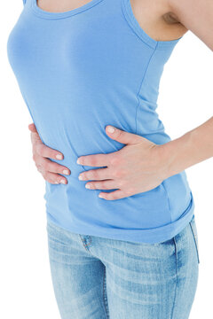 Woman suffering from stomach pain 