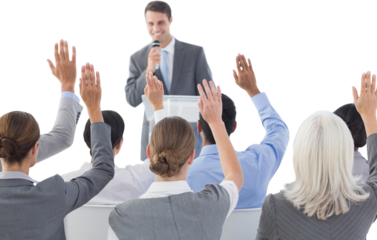 Business people raising their arms during meeting 