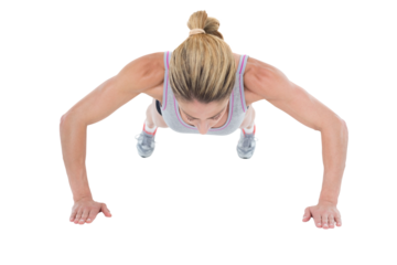 Strong woman doing press ups