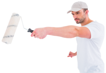 Handyman holding paint roller
