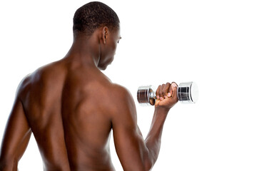 Fototapeta na wymiar Rear view of a fit shirtless young man lifting dumbbell