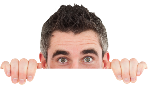 Man hiding behind white board