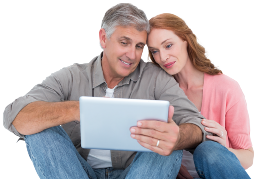 Casual couple sitting using tablet - Powered by Adobe
