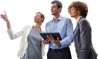 Businesswoman pointing while explaining with colleagues against white background