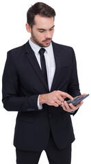 Concentrated businessman in suit using calculator 