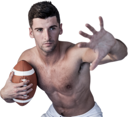 Shirtless rugby player defending