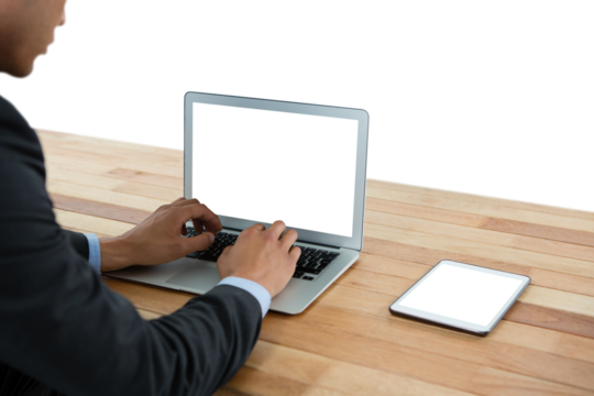 Cropped image of businessman typing on laptop