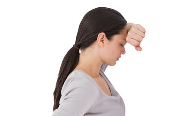 Sad woman leaning against the wall