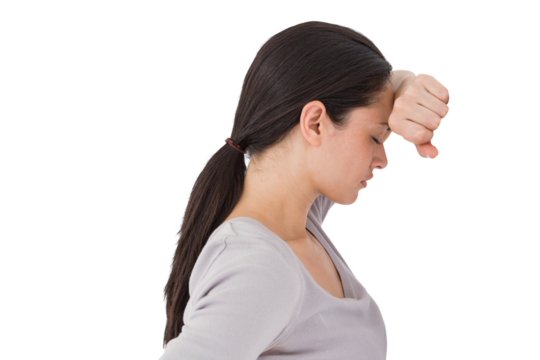 Sad woman leaning against the wall