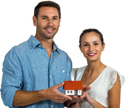 Man and woman holding house model