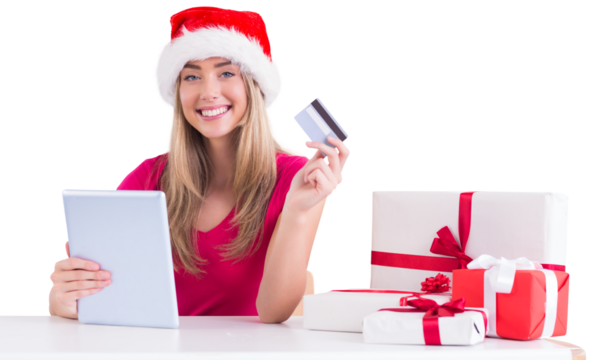 Festive blonde shopping online with tablet