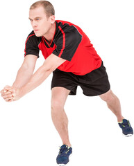 Naklejka na ściany i meble Sportsman posing while playing volleyball