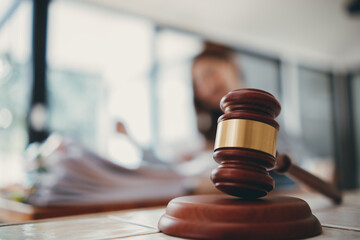 wooden judge gavel on table as symbol of justice for use in legal cases judicial system and civil...