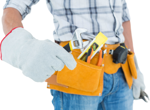 Technician using adjustable wrench against white background