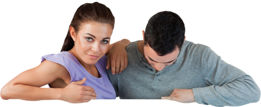 Young couple looking over a wall