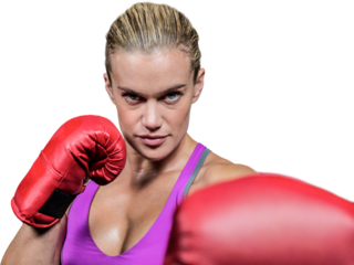 Portrait of female boxer with fighting stance