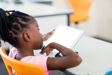 Young girl using digital tablet
