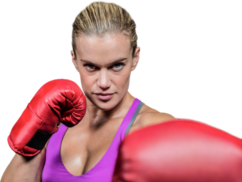 Portrait of female boxer with fighting stance
