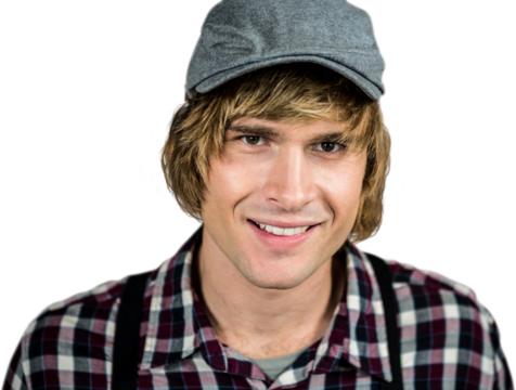 Smiling blond hipster staring at camera