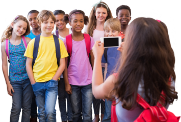 Cute pupils using mobile phone 