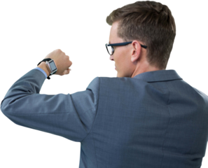 Rear view of businessman looking at his smart watch