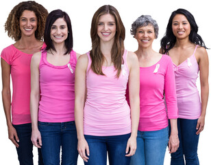 Portrait of confident females in pink outfits posing for breast cancer awareness