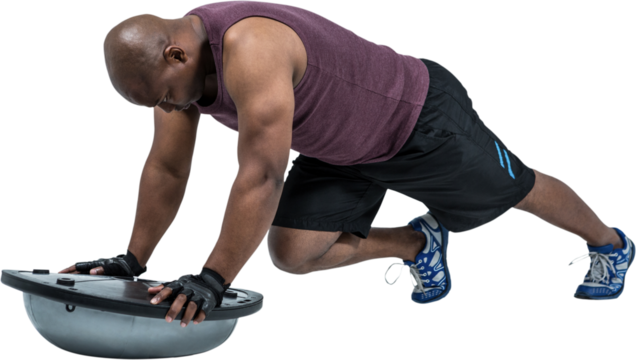 Fit man exercising with bosu ball - Powered by Adobe