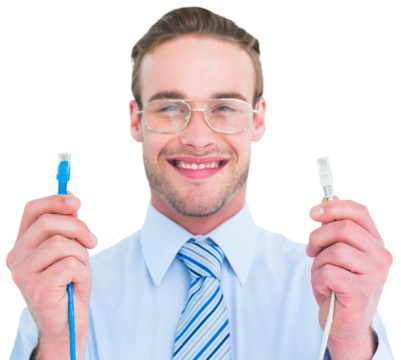 Geeky businessman holding two cables - Powered by Adobe