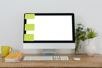 Blank sticky notes on desktop pc