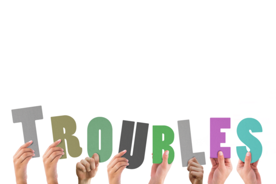 Cropped hands holding colorful alphabets forming troubles - Powered by Adobe