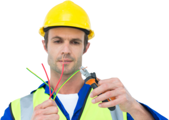 Handsome electrician cutting wire with pliers