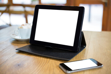 Obraz na płótnie Canvas Digital tablet and smart phone on table