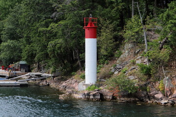 A lighthouse is a navigational landmark that is used to identify coasts and locate ships.