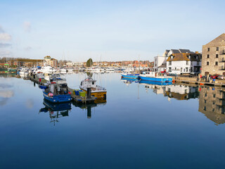 Boats in the old town of Weymouth Harbour and Weymouth Marina in Dorset, England, UK